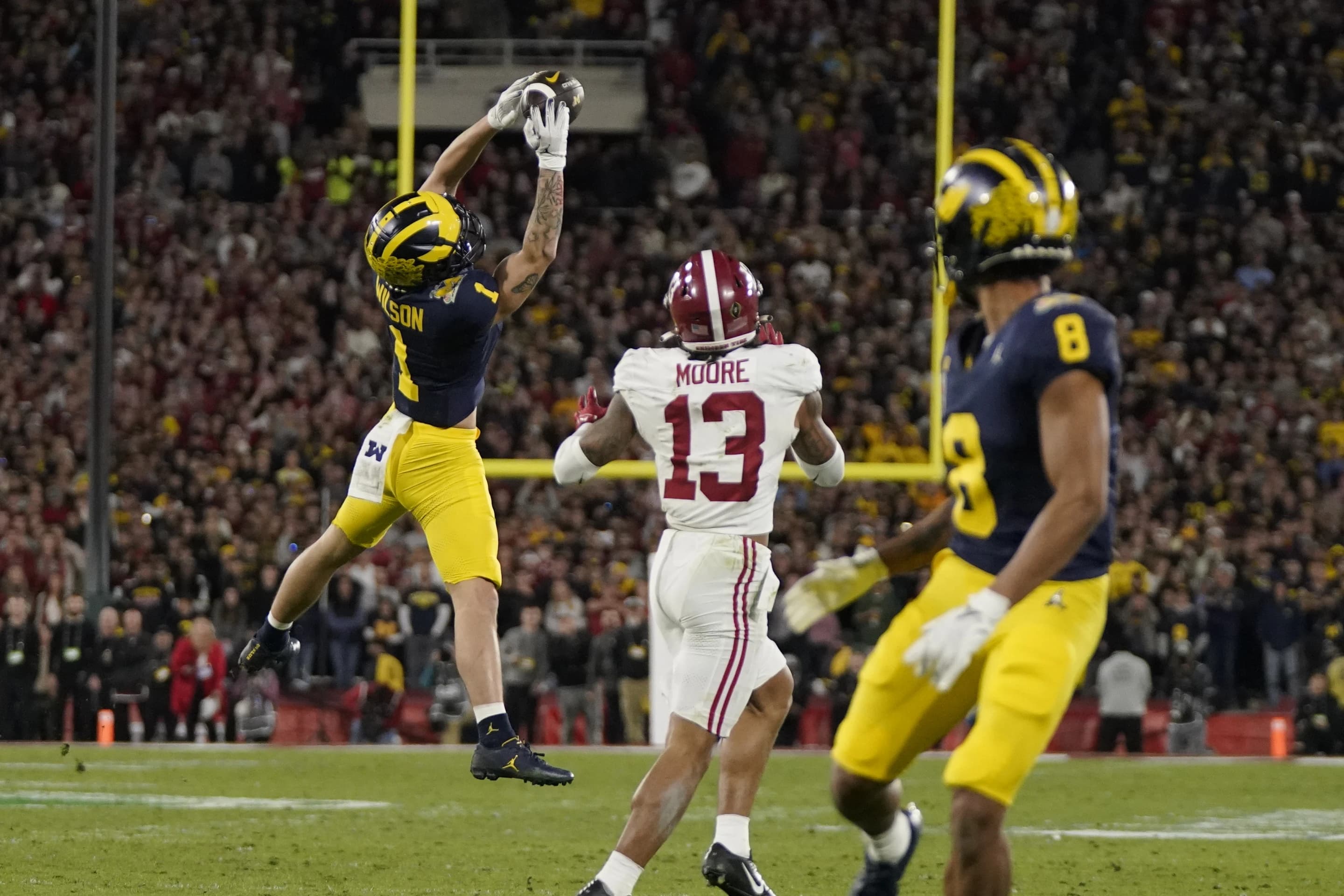 A Michigan receiver makes a catch in the Rose Bowl