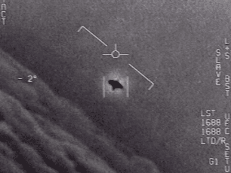 Grainy, grayscale photo suspected to be a potential UAP